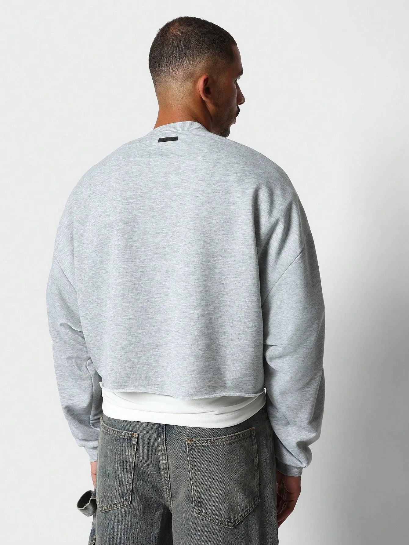 Crop Fit Sweatshirt With Raw Hem And Piping Detail